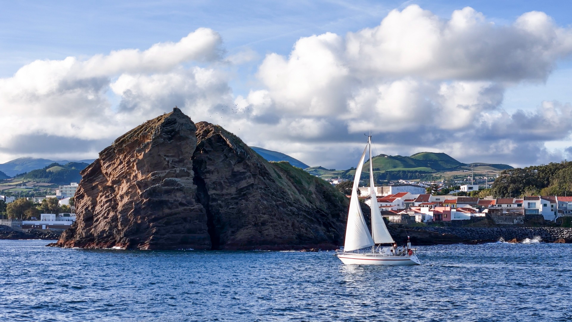 Sailboat near the volcanic coast of São Miguel