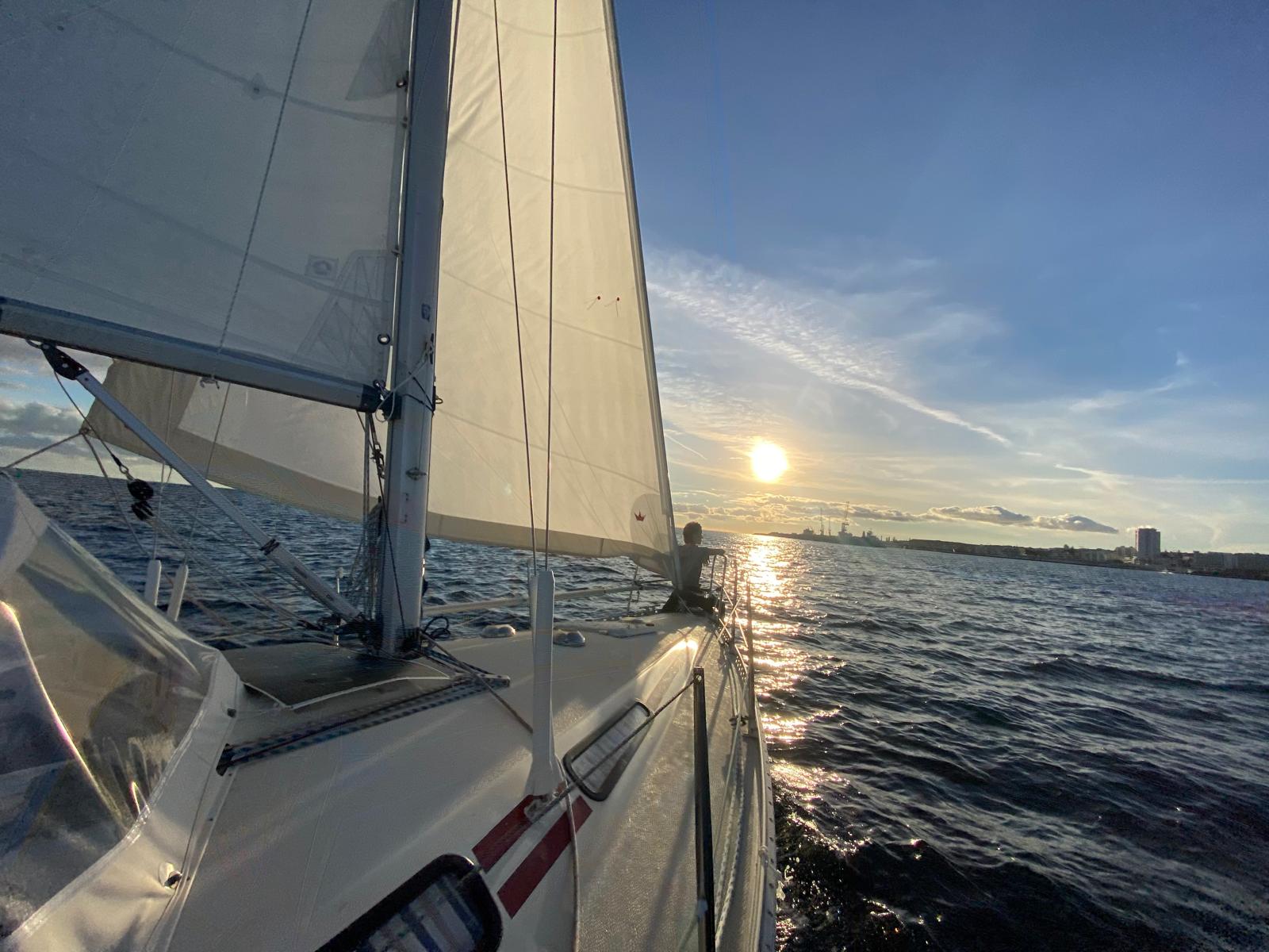 Sailboat sailing in the evening light